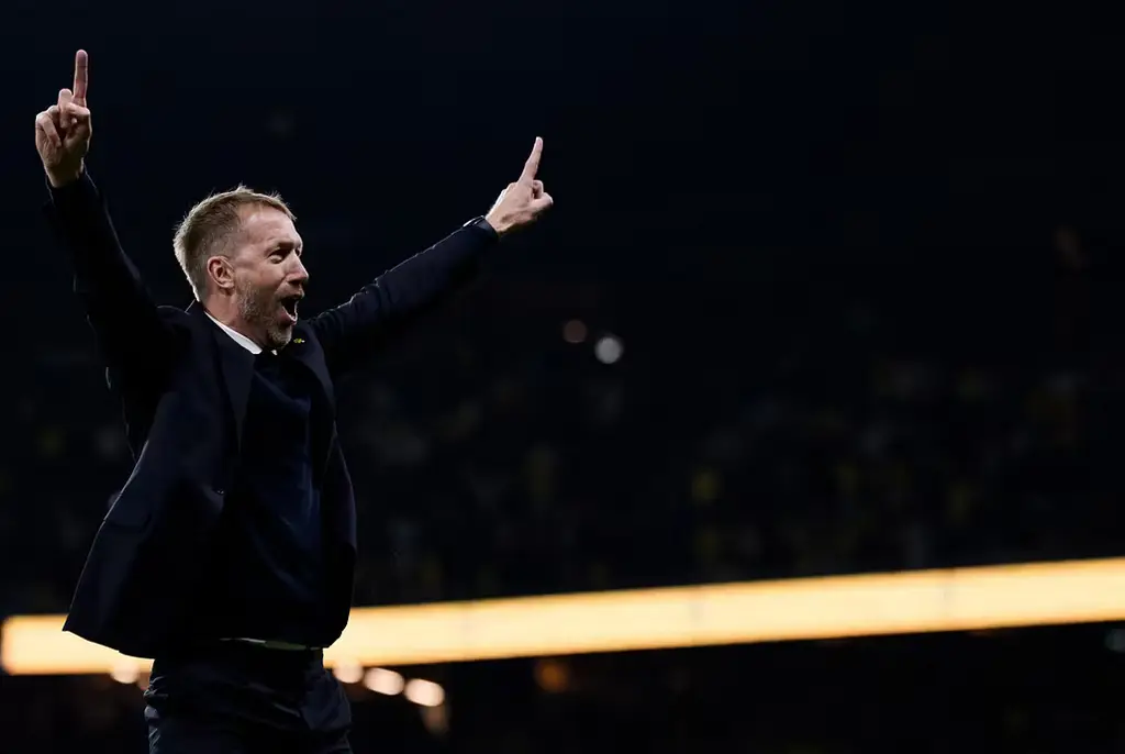 Graham Potter firar under matchen mot Polen 28 september.